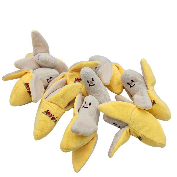 Group of Pawcurement Banana Rama Dog Toys with smiling banana designs