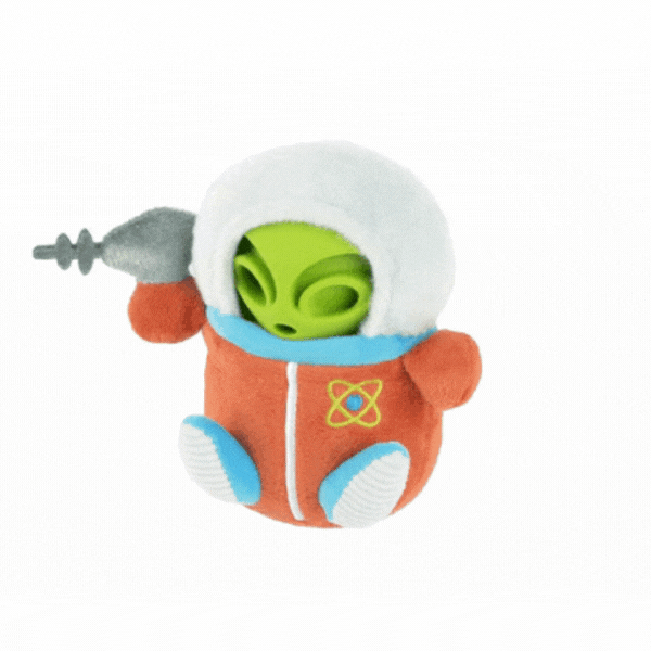Animated GIF showing the P.L.A.Y. Alien Buddy Astro Explorer dog toy being unwrapped to reveal the hidden green alien inside.