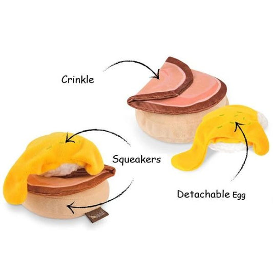 P.L.A.Y. Barking Brunch Benny’s Benedict plush dog toy showing detachable egg, squeaker, and crinkle features