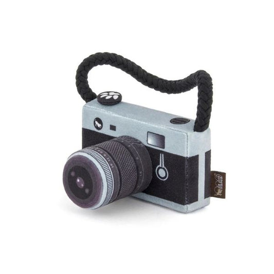 P.L.A.Y. Globetrotter Lens Licker Camera plush dog toy with braided rope strap, squeaker, and crunchy bottle sound