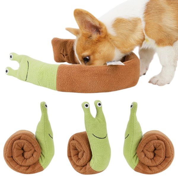 Dog playing with the Snail Snuffle dog toy, unrolling the plush snail to reveal hidden treat compartments