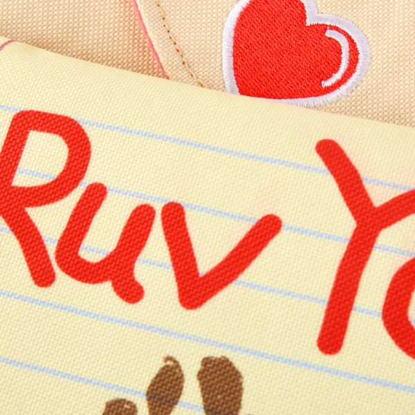 Close-up of P.L.A.Y. Love Bug Ruv Letter dog toy