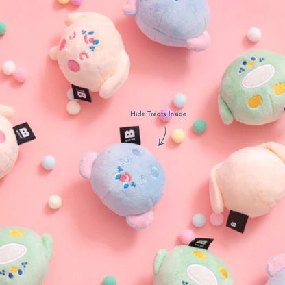 BITE ME Fluffy Friends Multi-Pack Ball Toy (3pcs) displayed in a playful flat lay featuring the three plush ball characters.