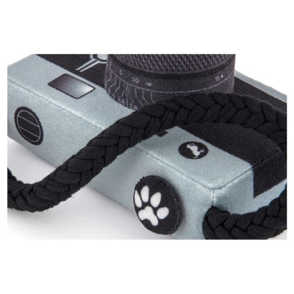 P.L.A.Y Globetrotter Collection | Close-up view of Lens Licker Camera plush dog toy