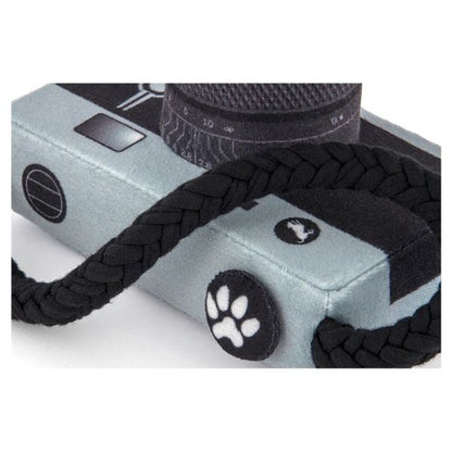 P.L.A.Y Globetrotter Collection | Close-up view of Lens Licker Camera plush dog toy