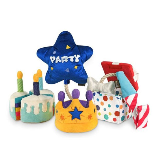 P.L.A.Y. Party Time collection group featuring Bone Appétit Cake, Canine Crown, and Pawfect Present plush dog toys