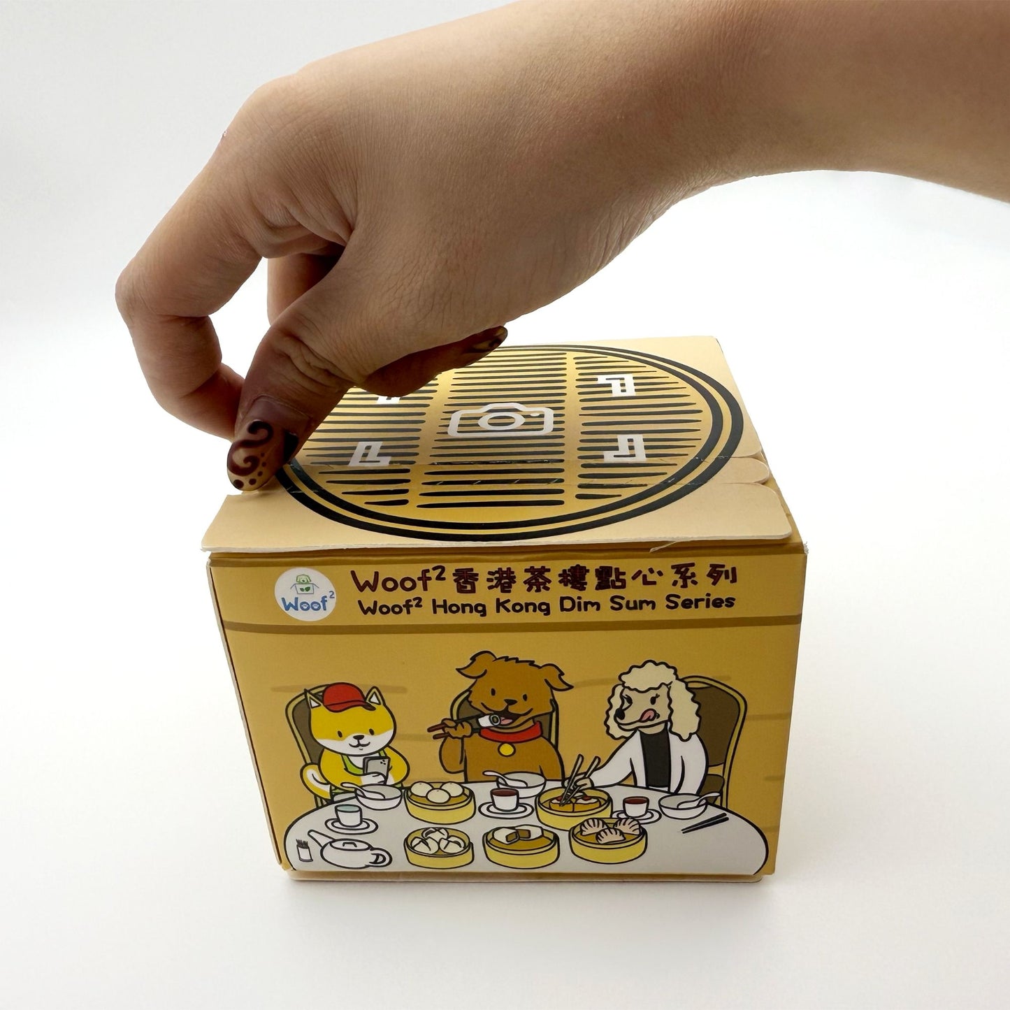 Woof² dim sum blind box dog toy packaging shown unopened with illustrated box design