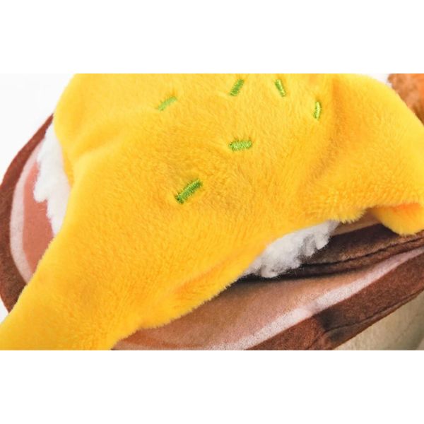 Close-up view of P.L.A.Y. Barking Brunch Benny's Benedict plush dog toy 