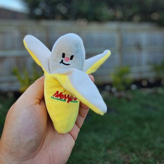 Close-up of Pawcurement Banana Rama Dog Toy held in hand