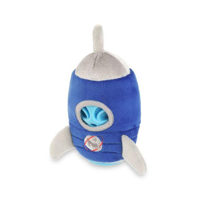 Side view of the P.L.A.Y. Alien Buddy Starblaster dog toy showing the rocket-shaped plush design with the blue alien peeking through the window.
