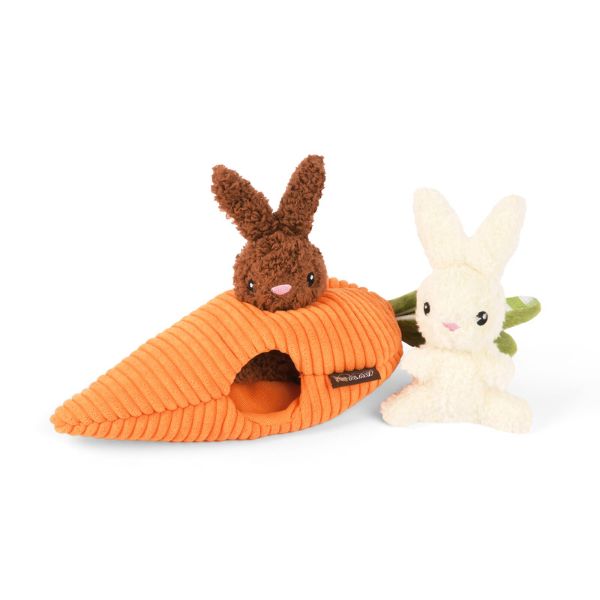 P.L.A.Y. Hippity Hoppity Funny Bunnies plush dog toy featuring two bunnies with a carrot burrow