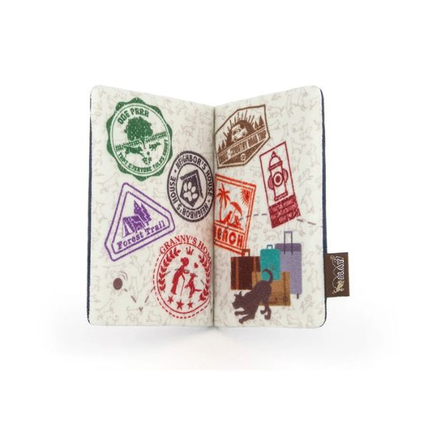P.L.A.Y Globetrotter Collection | Inside of a Pupster Passport plush dog toy