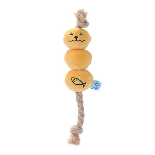 Front view of the Woof² Curry Fishball Dog Toy featuring three plush fishballs connected by a rope for tug and fetch play.