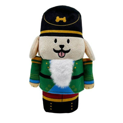 Front view of the Woof² Nutcracker Treat-Dispensing Dog Toy showing festive green uniform, plush details, and beard treat pocket.